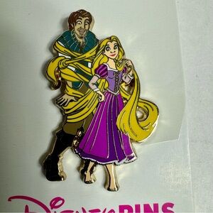 NWT. Disney pin trading Rapunzel and Flynn pin. Rapunzel and all of hair